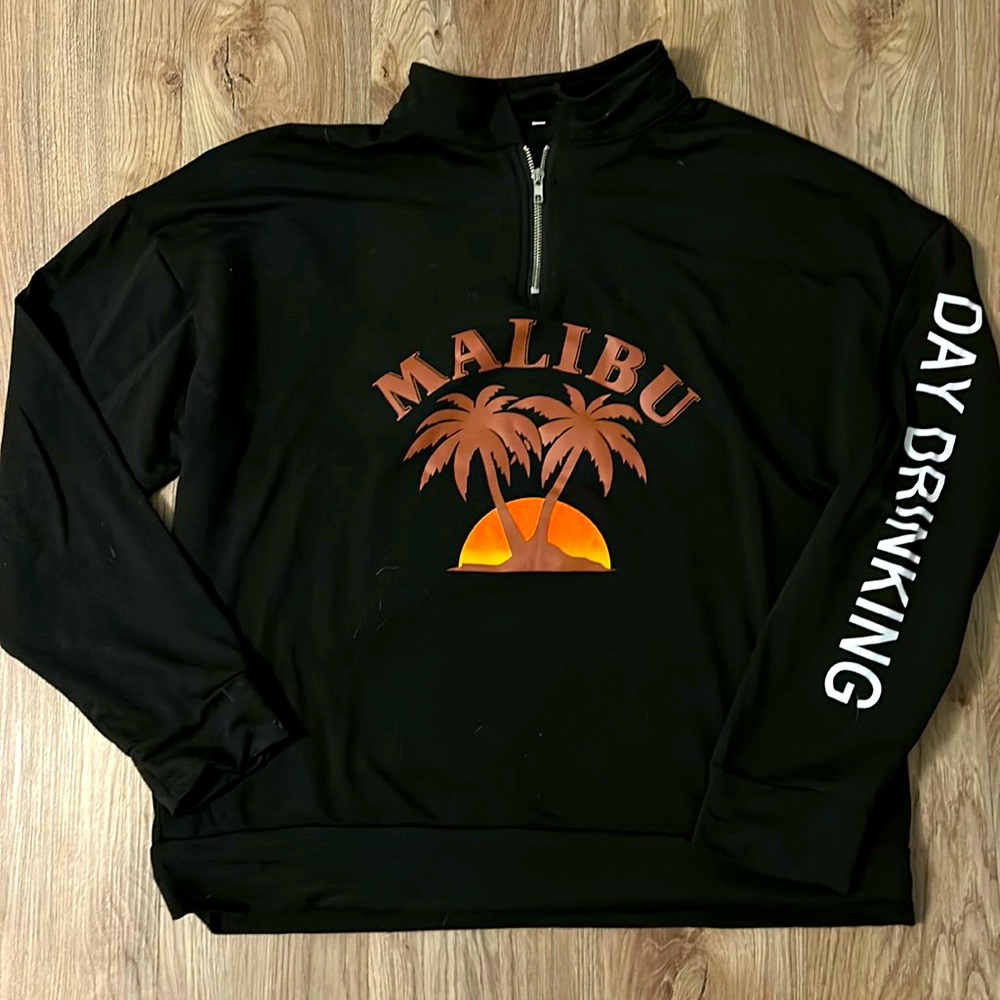 Maliby sweatshirt, sleeve says “day drinking”